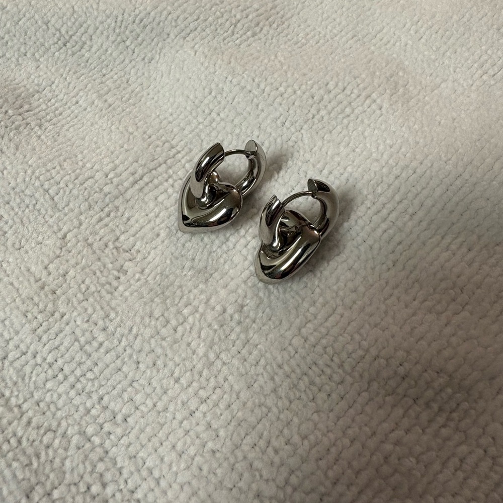 Never worn adorable Chunky Silver tone Heart Hoop‎ Earrings. Casual or dressy.